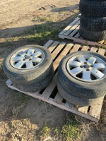 Set of four summer tires on Kia four bolt rims