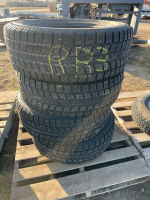 Stack of four Toyo tires