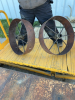 Two steel implement wheels