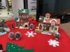 CHRISTMAS VILLAGE - (6) BUILDINGS, A FEW ACCESSORIES - IN A GOOD LIDDED TOTE AND A TREE SKIRT - 4