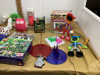 BOX W/ MISC NEW STOCKING STUFFER ITEMS - BATTERY OPERATED TOOTHBRUSH, JEWELRY HOLDER, TRAVEL MONOPOLY, KEY CHAINS - 2