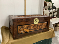 WOOD CHEST W/ CARVED DECOR AROUND ALL SIDES