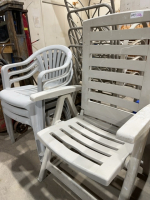 Adjustable plastic lawn chair and three stacking chairs