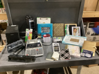 2 BOXES- ADDING MACHINE,SPEAKER, HEATER, BOOKS, NOTE BOOKS, JOURNALS, BINDERS, MISC