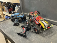 2 REMOTE CONTROL CARS WITH REMOTES