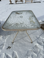 Patio table with glass top