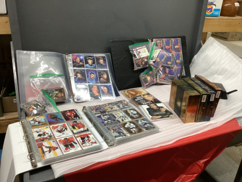 BOX W/ STAR TREK COLLECTOR CARDS, (2) BINDERS OF HOCKEY CARDS, LORD OF THE RINGS DVD SET