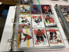 BOX W/ STAR TREK COLLECTOR CARDS, (2) BINDERS OF HOCKEY CARDS, LORD OF THE RINGS DVD SET - 2