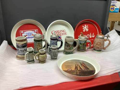 COLLECTION OF BEER STEINS, BEER TRAYS, BUDWEISER HEAD PHONES