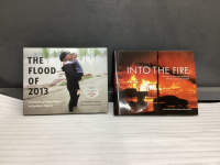 2 HARD COVER BOOKS - "THE FLOOD OF 2013" & "INTO THE FIRE"