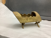 BRASS COLOURED WELDED STEEL "LOG" CUTOUT W/ REBAR LEGS