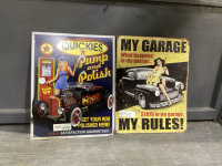 (2) METAL MAN CAVE SIGNS