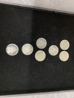 (7) CANADA 50 CENT COINS - 1980-1986 AND 2002