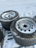 Set of four Michelin car tires on Dodge six bolt rims