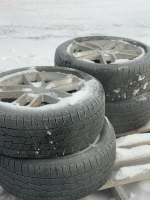 Set of four tires on Chev. Alum. rims