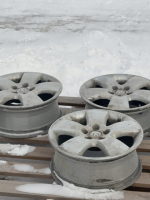 Three Volkswagen rims