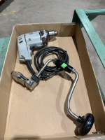 Flat with a brace and bit and electric drill