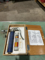 Small grease gun in case