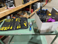 Box of screwdrivers, cleaning fluid