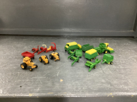 SMALL BOX OF MINI CAST JD COMBINE, WAGONS, BALERS, IMPLEMENTS AND INTERNATIONAL TRACTORS