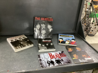 HARD COVER BOOKS ABOUT THE BEATLES & (2) TIN SIGNS
