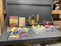 COOKBOOKS, AROMATHERAPY BOOKS, PLASTIC "SHIP" CLOCK, PLASTIC HONEY CONTAINERS, TRAVEL IRON, PLASTIC CUPS